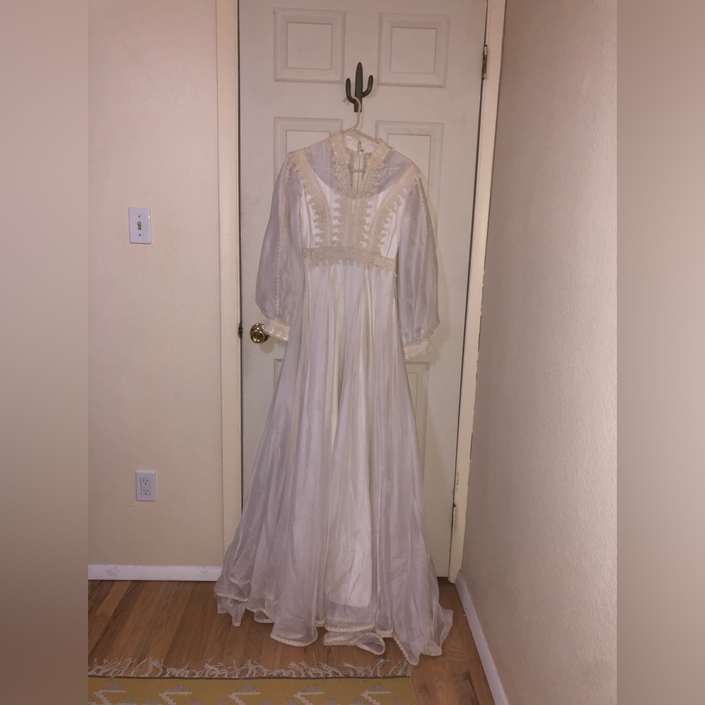 Vintage white wedding dress with English net tulle and lace in a size 4